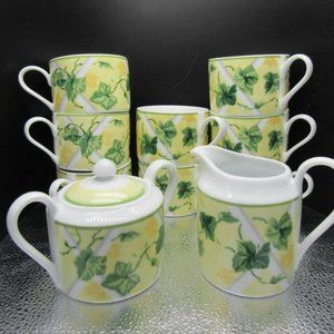 Vintage set of 8 coffee/tea mugs with sugar and creamer.